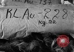 Image of warehouse filled with concentration camp prisoner belongings Poland, 1945, second 28 stock footage video 65675050451