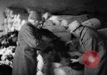 Image of warehouse filled with concentration camp prisoner belongings Poland, 1945, second 54 stock footage video 65675050451