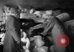 Image of warehouse filled with concentration camp prisoner belongings Poland, 1945, second 58 stock footage video 65675050451