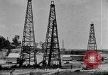 Image of Oil drilling derricks at various places in California Los Angeles California USA, 1925, second 12 stock footage video 65675050481
