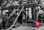 Image of Oil drilling derricks at various places in California Los Angeles California USA, 1925, second 14 stock footage video 65675050481