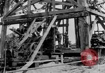 Image of Oil drilling derricks at various places in California Los Angeles California USA, 1925, second 16 stock footage video 65675050481