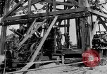 Image of Oil drilling derricks at various places in California Los Angeles California USA, 1925, second 17 stock footage video 65675050481