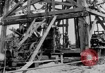 Image of Oil drilling derricks at various places in California Los Angeles California USA, 1925, second 19 stock footage video 65675050481