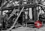 Image of Oil drilling derricks at various places in California Los Angeles California USA, 1925, second 20 stock footage video 65675050481