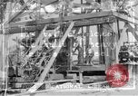 Image of Oil drilling derricks at various places in California Los Angeles California USA, 1925, second 22 stock footage video 65675050481