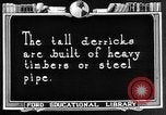 Image of Oil drilling derricks at various places in California Los Angeles California USA, 1925, second 23 stock footage video 65675050481