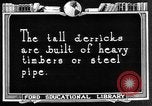 Image of Oil drilling derricks at various places in California Los Angeles California USA, 1925, second 25 stock footage video 65675050481