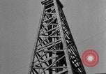 Image of Oil drilling derricks at various places in California Los Angeles California USA, 1925, second 30 stock footage video 65675050481