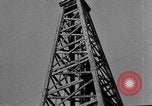 Image of Oil drilling derricks at various places in California Los Angeles California USA, 1925, second 31 stock footage video 65675050481