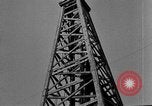 Image of Oil drilling derricks at various places in California Los Angeles California USA, 1925, second 32 stock footage video 65675050481