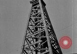 Image of Oil drilling derricks at various places in California Los Angeles California USA, 1925, second 33 stock footage video 65675050481