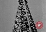 Image of Oil drilling derricks at various places in California Los Angeles California USA, 1925, second 34 stock footage video 65675050481