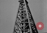 Image of Oil drilling derricks at various places in California Los Angeles California USA, 1925, second 36 stock footage video 65675050481
