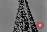 Image of Oil drilling derricks at various places in California Los Angeles California USA, 1925, second 37 stock footage video 65675050481