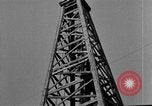 Image of Oil drilling derricks at various places in California Los Angeles California USA, 1925, second 38 stock footage video 65675050481