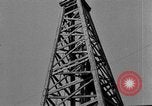 Image of Oil drilling derricks at various places in California Los Angeles California USA, 1925, second 39 stock footage video 65675050481