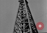 Image of Oil drilling derricks at various places in California Los Angeles California USA, 1925, second 40 stock footage video 65675050481