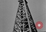 Image of Oil drilling derricks at various places in California Los Angeles California USA, 1925, second 41 stock footage video 65675050481