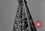 Image of Oil drilling derricks at various places in California Los Angeles California USA, 1925, second 42 stock footage video 65675050481