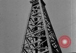 Image of Oil drilling derricks at various places in California Los Angeles California USA, 1925, second 43 stock footage video 65675050481