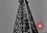 Image of Oil drilling derricks at various places in California Los Angeles California USA, 1925, second 44 stock footage video 65675050481