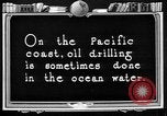Image of Oil drilling derricks at various places in California Los Angeles California USA, 1925, second 47 stock footage video 65675050481