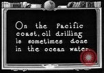 Image of Oil drilling derricks at various places in California Los Angeles California USA, 1925, second 50 stock footage video 65675050481