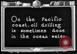 Image of Oil drilling derricks at various places in California Los Angeles California USA, 1925, second 51 stock footage video 65675050481