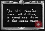 Image of Oil drilling derricks at various places in California Los Angeles California USA, 1925, second 52 stock footage video 65675050481