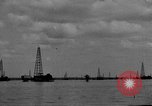 Image of Oil drilling derricks at various places in California Los Angeles California USA, 1925, second 55 stock footage video 65675050481