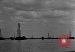 Image of Oil drilling derricks at various places in California Los Angeles California USA, 1925, second 56 stock footage video 65675050481