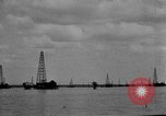 Image of Oil drilling derricks at various places in California Los Angeles California USA, 1925, second 58 stock footage video 65675050481
