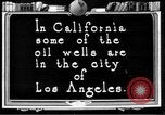 Image of Oil drilling derricks at various places in California Los Angeles California USA, 1925, second 59 stock footage video 65675050481