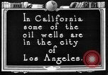 Image of Oil drilling derricks at various places in California Los Angeles California USA, 1925, second 60 stock footage video 65675050481
