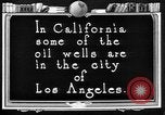 Image of Oil drilling derricks at various places in California Los Angeles California USA, 1925, second 62 stock footage video 65675050481