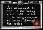 Image of Preparing an oil drilling bit and drilling for oil United States USA, 1925, second 1 stock footage video 65675050482