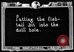 Image of Preparing an oil drilling bit and drilling for oil United States USA, 1925, second 20 stock footage video 65675050482