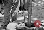 Image of Preparing an oil drilling bit and drilling for oil United States USA, 1925, second 33 stock footage video 65675050482