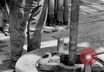 Image of Preparing an oil drilling bit and drilling for oil United States USA, 1925, second 34 stock footage video 65675050482