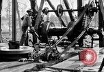 Image of Preparing an oil drilling bit and drilling for oil United States USA, 1925, second 38 stock footage video 65675050482