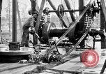 Image of Preparing an oil drilling bit and drilling for oil United States USA, 1925, second 39 stock footage video 65675050482