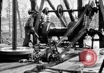 Image of Preparing an oil drilling bit and drilling for oil United States USA, 1925, second 40 stock footage video 65675050482