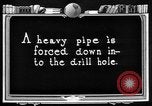 Image of Preparing an oil drilling bit and drilling for oil United States USA, 1925, second 42 stock footage video 65675050482