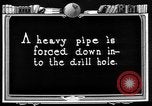 Image of Preparing an oil drilling bit and drilling for oil United States USA, 1925, second 44 stock footage video 65675050482