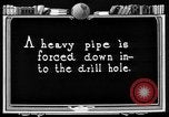 Image of Preparing an oil drilling bit and drilling for oil United States USA, 1925, second 45 stock footage video 65675050482