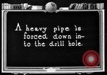 Image of Preparing an oil drilling bit and drilling for oil United States USA, 1925, second 46 stock footage video 65675050482