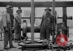 Image of Preparing an oil drilling bit and drilling for oil United States USA, 1925, second 54 stock footage video 65675050482