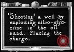 Image of "Shooting" an oil well with nitroglycerin United States USA, 1925, second 1 stock footage video 65675050483