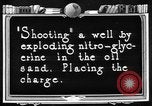 Image of "Shooting" an oil well with nitroglycerin United States USA, 1925, second 7 stock footage video 65675050483